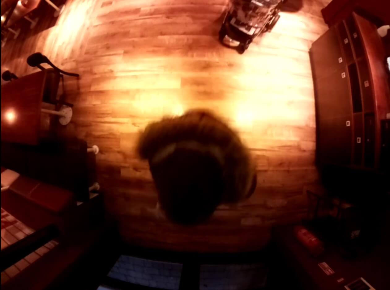 The person’s head cannot be seen clearly.